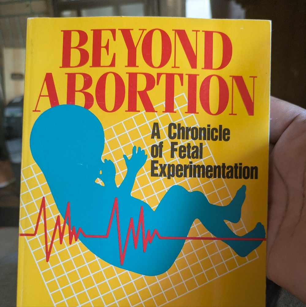 Beyond Abortion Book - Yellow and Blue Cover